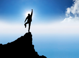 Tourist on the mountain top. Sport and active life concept