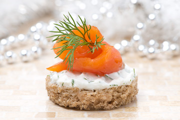 canape with rye bread, cream cheese, salmon