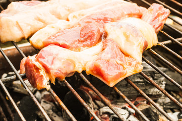 Fresh pork grilled on charcoal.