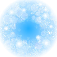 Blue snowflakes light winter background