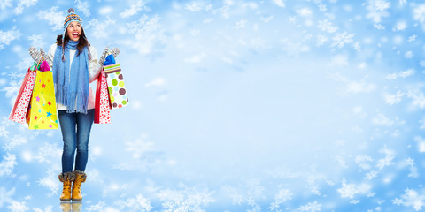 Girl with shopping bags. Christmas sale.