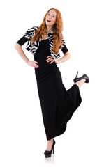 Redhead in black dress isolated on white