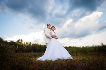 Groom and bride in nature