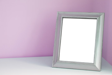 Blank picture frame at the desk