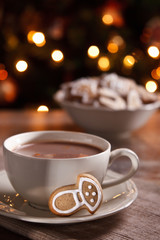 A cup of hot chocolate with gingerbread