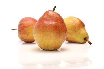 Pears and apples on a white background