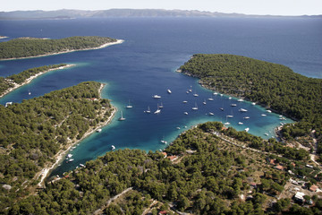 Sailing boats in quiet bay on island Brac in Croatia