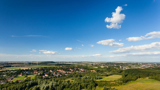 Time lapse sequence with wind turbines and clouds