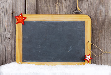 Dekorativer Weihnachtshintergrund mit Schiefertafel