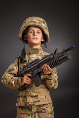 Young soldier with rifle