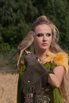 Woman with howk on hand