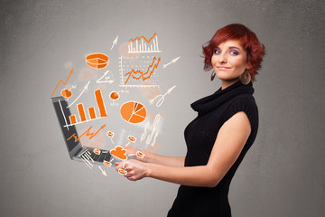 Beautiful lady holding notebook with graphs and statistics