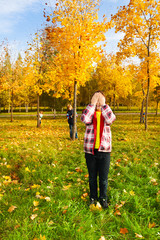 Hide and seek game in the autumn park