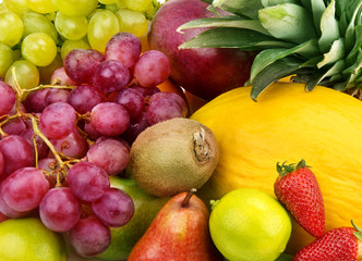 Naklejka na ściany i meble Multicolored background of fruits and berries