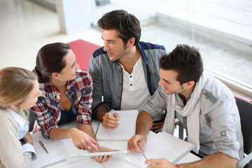 Young people meeting with digital tablet