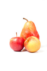 isolated apples and pear with water drops