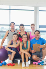 Portrait of an instructor with fitness class