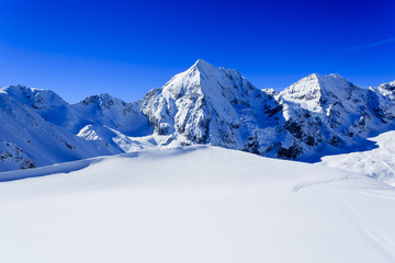 Winter mountains- snow-capped peaks of the Alps