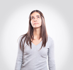Obraz premium Young woman looking up