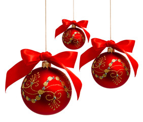 Red christmas balls with ribbon isolated on a white