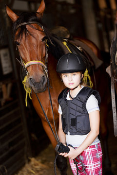 Horse and lovely equestrian girl