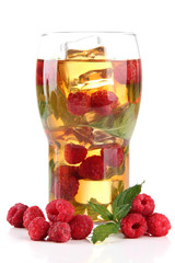 Fototapeta na wymiar Iced tea with raspberries and mint isolated on white