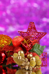 Composition of Christmas balls on purple background