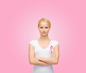 woman in blank t-shirt with pink cancer ribbon