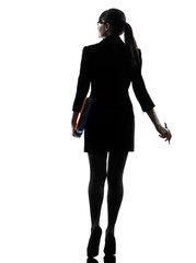 business woman  holding folders files leaving silhouette