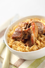 Pork ribs baked with sauerkraut