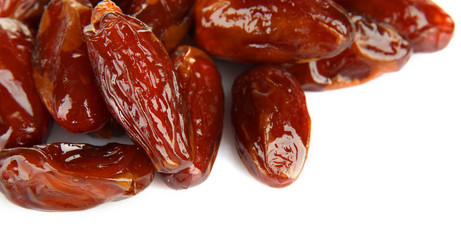 Dried dates isolated on white