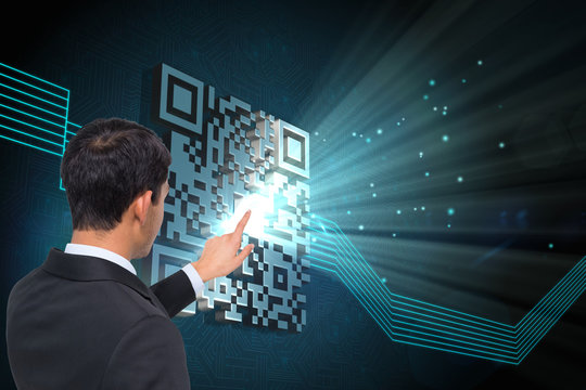 Composite image of asian businessman pointing