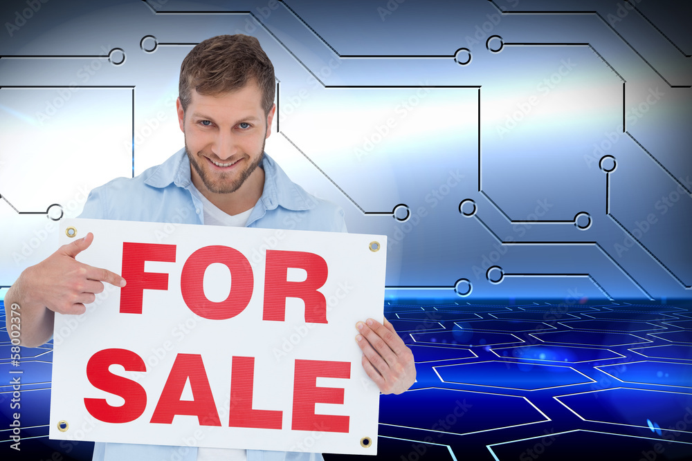 Poster composite image of smiling model holding a for sale sign