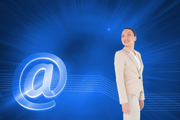 Composite image of smiling asian businesswoman