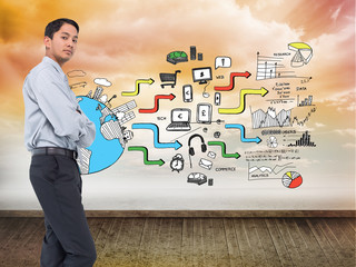 Composite image of serious asian businessman