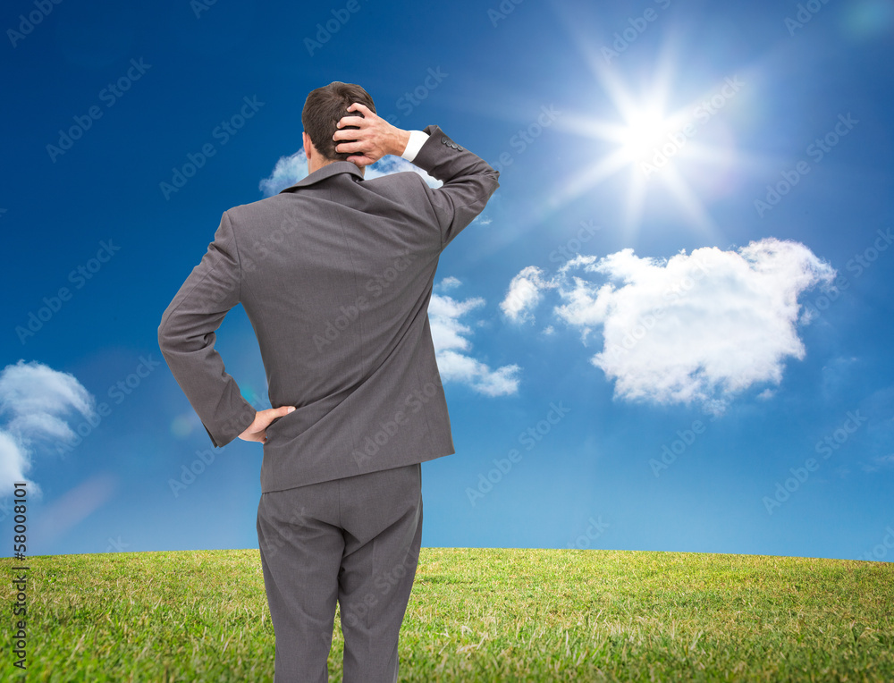 Poster composite image of young businessman standing back to camera scr