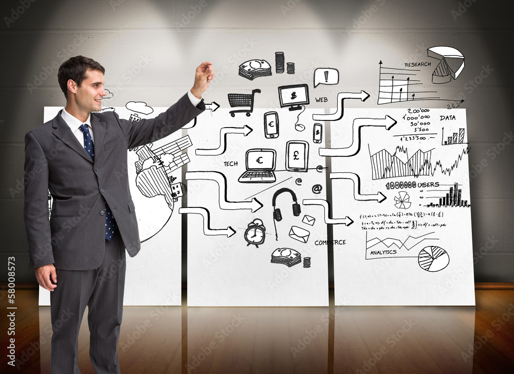 Poster Composite image of smiling businessman holding something up in t