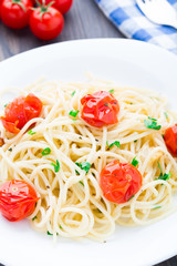 Spaghetti with roasted tomatoes and herbs