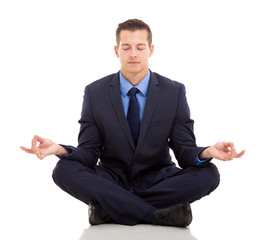 businessman meditating - Powered by Adobe