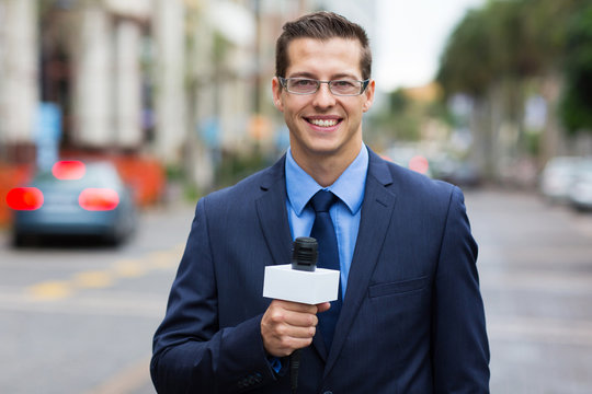 news reporter live broadcasting on street