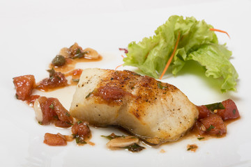 Grilled halibut with tomato concasse.