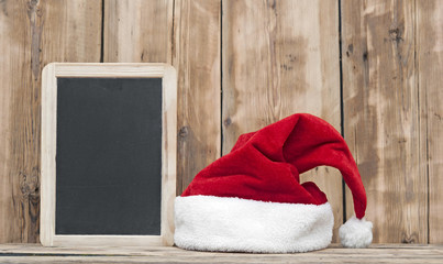 Obraz na płótnie Canvas blackboard with santa hat