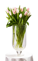 Pink and white tulips bouquet in vase. With path.