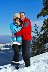 young couple on winter vacation