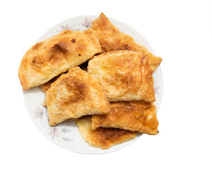 fresh tasty meat pies on a white background
