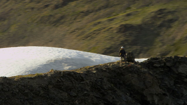 Aerial view of high Peak climber achieving success Alaska