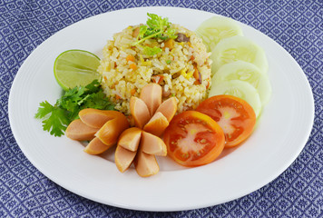 Rice with vegetables and sausages