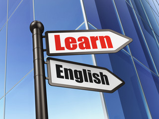Education concept: sign Learn English on Building background
