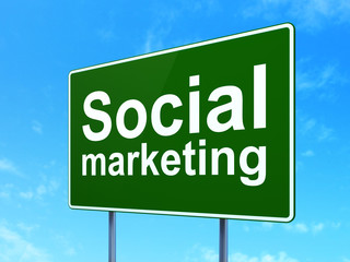 Advertising concept: Social Marketing on road sign background