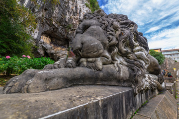 Fototapeta na wymiar Sleeping lion sculpture in Covadonga, Asturias